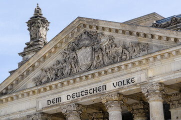 The Reichstag building (Bundestag) in Berlin, Germany, meeting place of the German parliament: The inscription says: Dem Deutschen Volke - To the German people