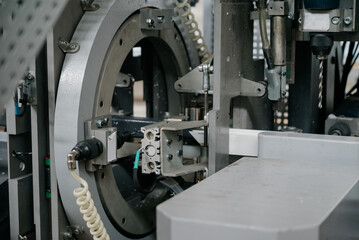 Factory for aluminum and PVC windows and doors production. Details industrial equipment.