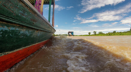 Water level view of Tonle Sap Lake in Cambodia from a tourist boat
