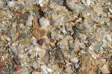 Close-up of Agia Galini conglomerate; clastic sediment, clumped together, cemented stones 