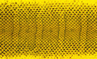 Snakeskin leather background. Texture yellow snake skin. Leather surface.