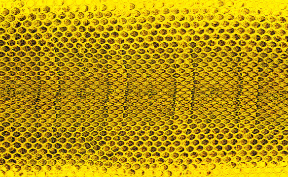 Snakeskin leather background. Texture yellow snake skin. Leather surface.