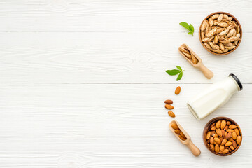Vegan organic drink - almond milk with almond nuts, top view