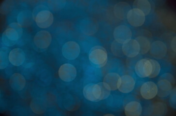 Festive background. Blue background with bokeh. Blurred background. Abstraction circles.