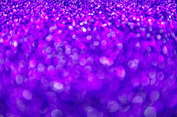 Festive background. Violet background with bokeh. Blurred background. Abstraction circles.