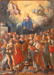 Fototapeta na wymiar MONOPOLI, ITALY - MARCH 6, 2022: The painting of Madonna, Holy Trinity and the saints in church Santa Theresia by Gianbattista Lama (1711).