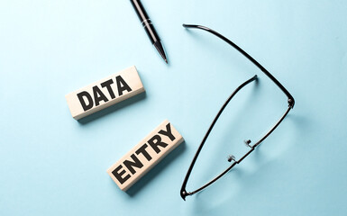 DATA ENTRY text on the wooden block ,blue background