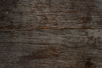 beautiful aged countertop made of natural wood of dark color