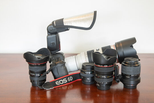 Brasília, DF, Brazil, May 03, 2022: Modern digital Canon 6D full frame camera with multiple lenses