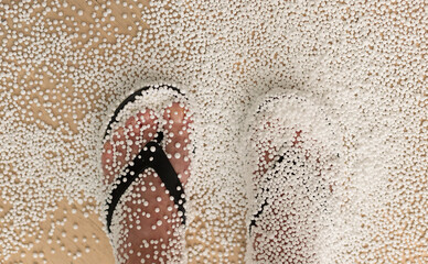 Electrified polystyrene balls clinging to the legs