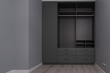 Apartment interior with modern design. Part of room interior, closet with empty shelves