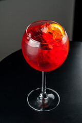 Cocktail with ice.  Mojito, aperol, soda, vodka, alcohol, martini.  Summer, cocktail, beach.  Cocktail on a black background.  Mint with lemon and ice.  Refreshing cocktail in hot weather