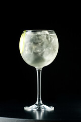 Cocktail with ice.  Mojito, aperol, soda, vodka, alcohol, martini.  Summer, cocktail, beach.  Cocktail on a black background.  Mint with lemon and ice.  Refreshing cocktail in hot weather