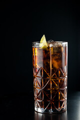 Cocktail with ice.  Mojito, aperol, soda, vodka, alcohol, martini.  Summer, cocktail, beach.  Cocktail on a black background.  Mint with lemon and ice.  Refreshing cocktail in hot weather