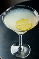 Cocktail with ice.  Mojito, aperol, soda, vodka, alcohol, martini.  Summer, cocktail, beach.  Cocktail on a black background.  Mint with lemon and ice.  Refreshing cocktail in hot weather