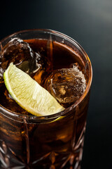 Cocktail with ice.  Mojito, aperol, soda, vodka, alcohol, martini.  Summer, cocktail, beach.  Cocktail on a black background.  Mint with lemon and ice.  Refreshing cocktail in hot weather