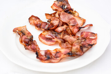 slices of bacon dripping grease straight from the heat