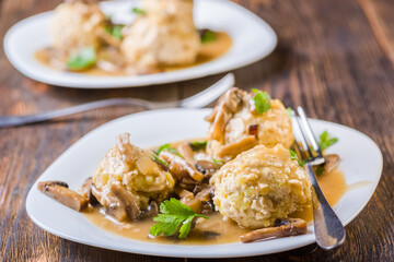 meat and potato balls in mushroom sauce