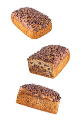 Banana bread with chocolate filling and chocolate drops on the top on a white isolated background