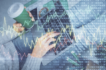Double exposure of woman hands typing on computer and forex chart hologram drawing. Stock market invest concept.