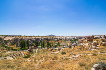 Fototapeta na wymiar Goreme view. Landscape of the Cappadocia from a hill in the summer