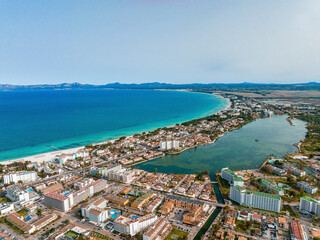 Aerial view of the beach in Palma de Mallorca with the town and harbor below beautiful coastline scenery Spain Mediterranean Sea, Balearic Islands.