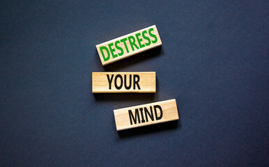 Destress your mind symbol. Concept words Destress your mind on wooden blocks. Beautiful black table black background. Psychological business and destress your mind concept. Copy space.