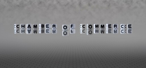 chamber of commerce word or concept represented by black and white letter cubes on a grey horizon background stretching to infinity