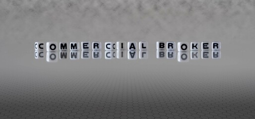 commercial broker word or concept represented by black and white letter cubes on a grey horizon...