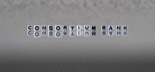 consortium bank word or concept represented by black and white letter cubes on a grey horizon background stretching to infinity - obrazy, fototapety, plakaty