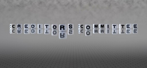 creditors committee word or concept represented by black and white letter cubes on a grey horizon...