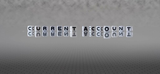 current account word or concept represented by black and white letter cubes on a grey horizon background stretching to infinity