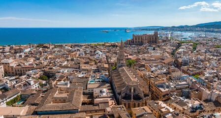 Fototapeta na wymiar Aerial view of the capital of Mallorca - Palma de Mallorca in Spain. A touristic city by the sea.