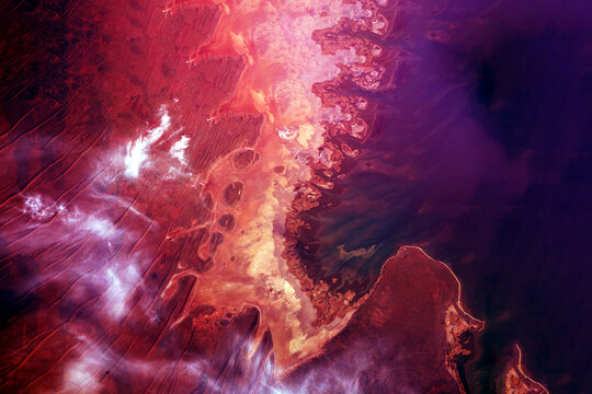 Mars surface from space. Elements of this image furnished by NASA - Powered by Adobe