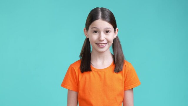 Schoolkid suddenly talk speak privacy isolated cyan color background