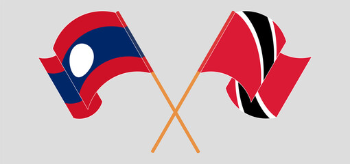 Crossed and waving flags of Laos and Trinidad and Tobago
