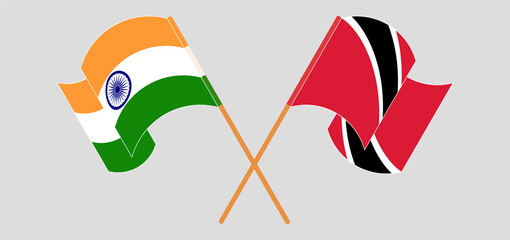 Crossed and waving flags of India and Trinidad and Tobago