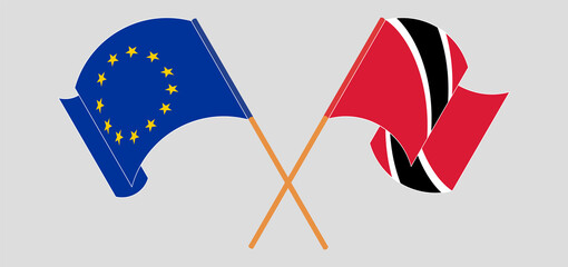 Crossed and waving flags of the European Union and Trinidad and Tobago