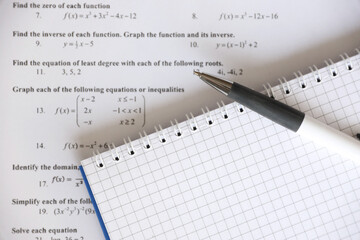Handwriting of mathematics quadratic equation on examination, practice, quiz or test in maths...