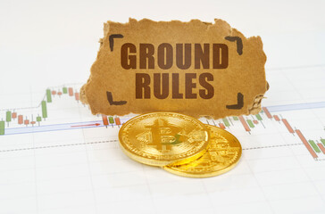 On the chart with quotes, there are bitcoins and there is a sign with the inscription - GROUND RULES