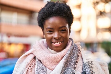 African american woman smiling confident standing at street