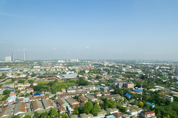 Aerial view of the roof of a house with a car taken by a drone, top view of road