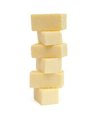 Cubes of cheddar cheese isolated on white 