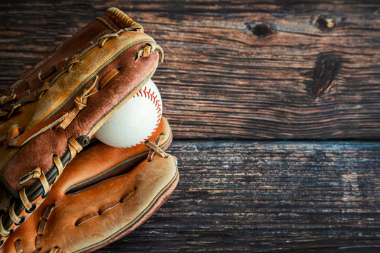 Leather Baseball or Softball Glove With Ball and Copy Space