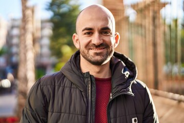 Young man smiling confident standing at street