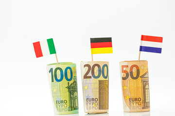 Inflation and economic recession in Europe. Flags of Germany, France and Italy euro bills on a white background.euro money inflation.Changes in the budget.