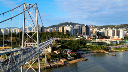 aerial drone image of suspension bridge connecting cities urban centers Ponte Hercílio Luz Florianópolis Santa Catarin cable-stayed bridge
