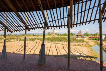 Fototapeta premium Bamboo building with flower garden in Chiangmai province