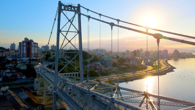 aerial drone image of suspension bridge connecting cities urban centers Ponte Hercílio Luz Florianópolis Santa Catarin cable-stayed bridge
