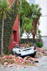 Earthquake - A Sedan car becomes a convertible during devastating Quake
